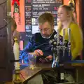 Marc pokes around on his phone, Christmas Day at the Swan Inn, Brome, Suffolk - 25th December 2014