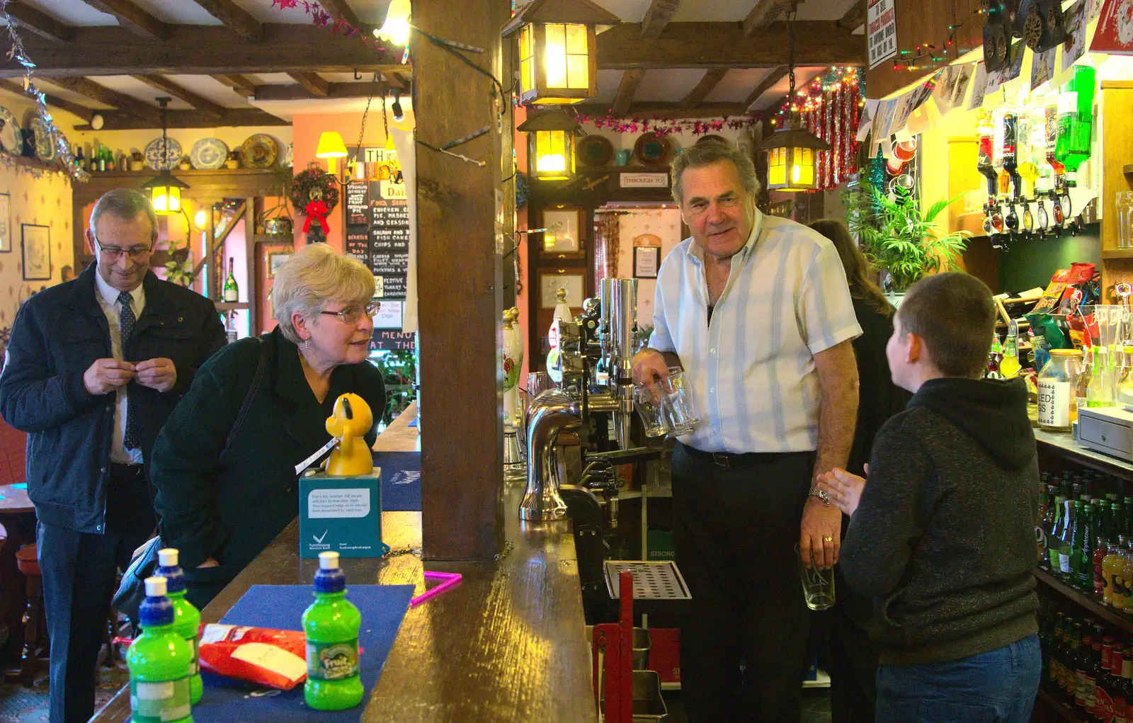 Alan behind the bar, from Christmas Day at the Swan Inn, Brome, Suffolk - 25th December 2014