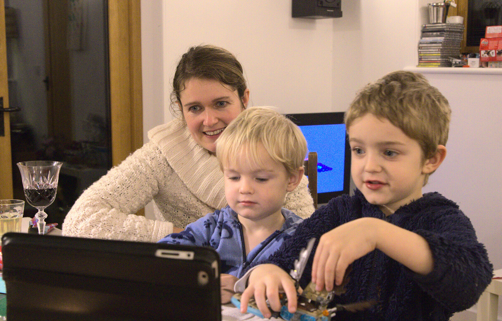 Isobel and the boys Skype someone from Christmas Day at the Swan Inn, Brome, Suffolk - 25th December 2014