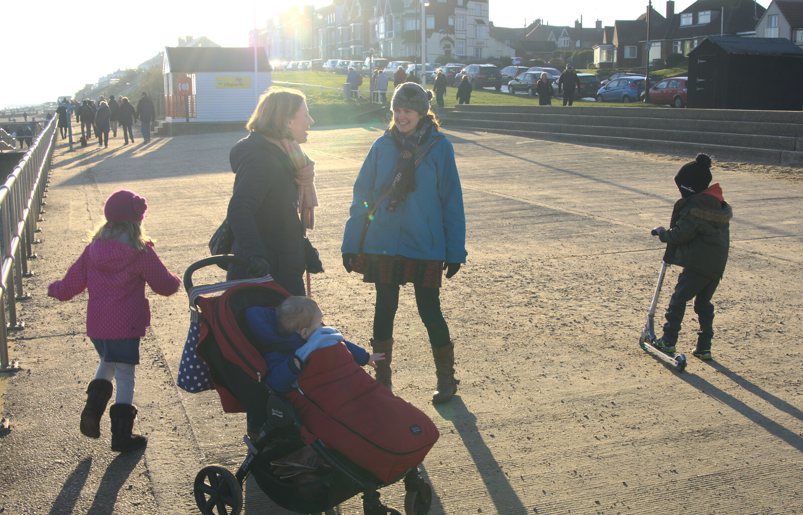 Isobel bumps in to someone she knows from Sunset on the Beach, Southwold, Suffolk - 30th December 2014
