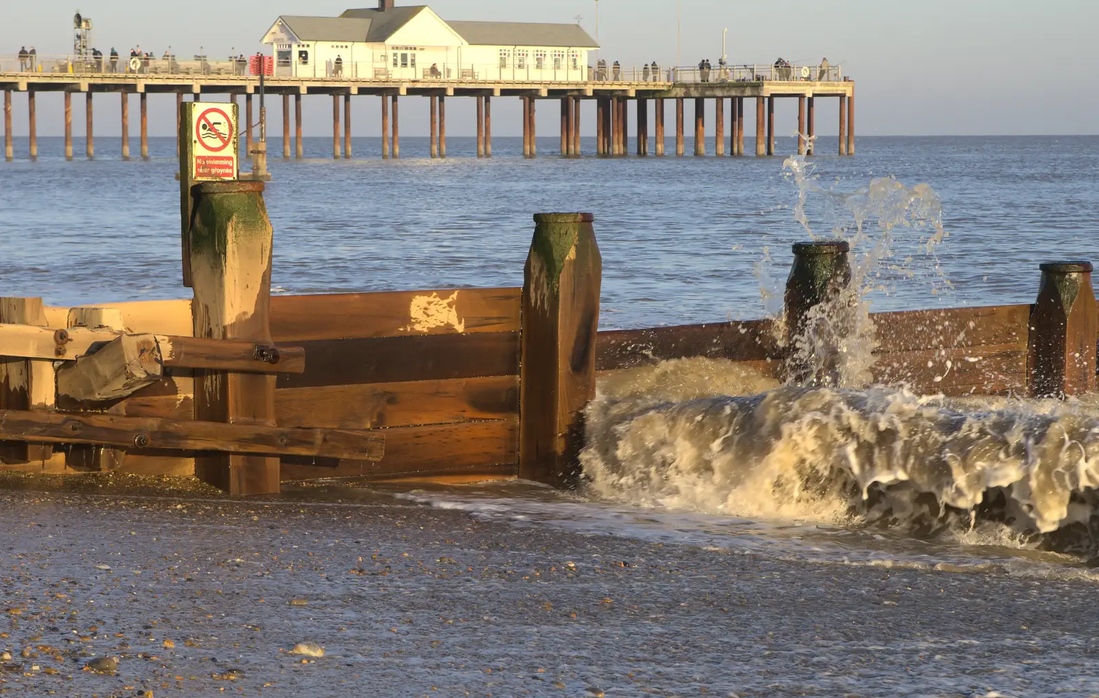 Waves crash on the groynes, from Sunset on the Beach, Southwold, Suffolk - 30th December 2014