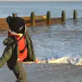 Fred hurls stones into the sea, Sunset on the Beach, Southwold, Suffolk - 30th December 2014