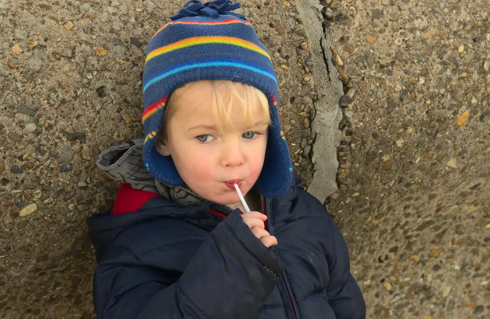 Harry's got a lollipop, from Sunset on the Beach, Southwold, Suffolk - 30th December 2014