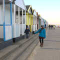 Harry walks along by the beach huts, Sunset on the Beach, Southwold, Suffolk - 30th December 2014