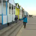 Harry walks along by the beach huts, Sunset on the Beach, Southwold, Suffolk - 30th December 2014