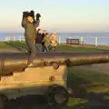 Fred perches on top of a cannon, Sunset on the Beach, Southwold, Suffolk - 30th December 2014