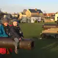 Harry sits on the barrel of a cannon, Sunset on the Beach, Southwold, Suffolk - 30th December 2014