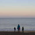 The gang stand by the sea's edge, Sunset on the Beach, Southwold, Suffolk - 30th December 2014