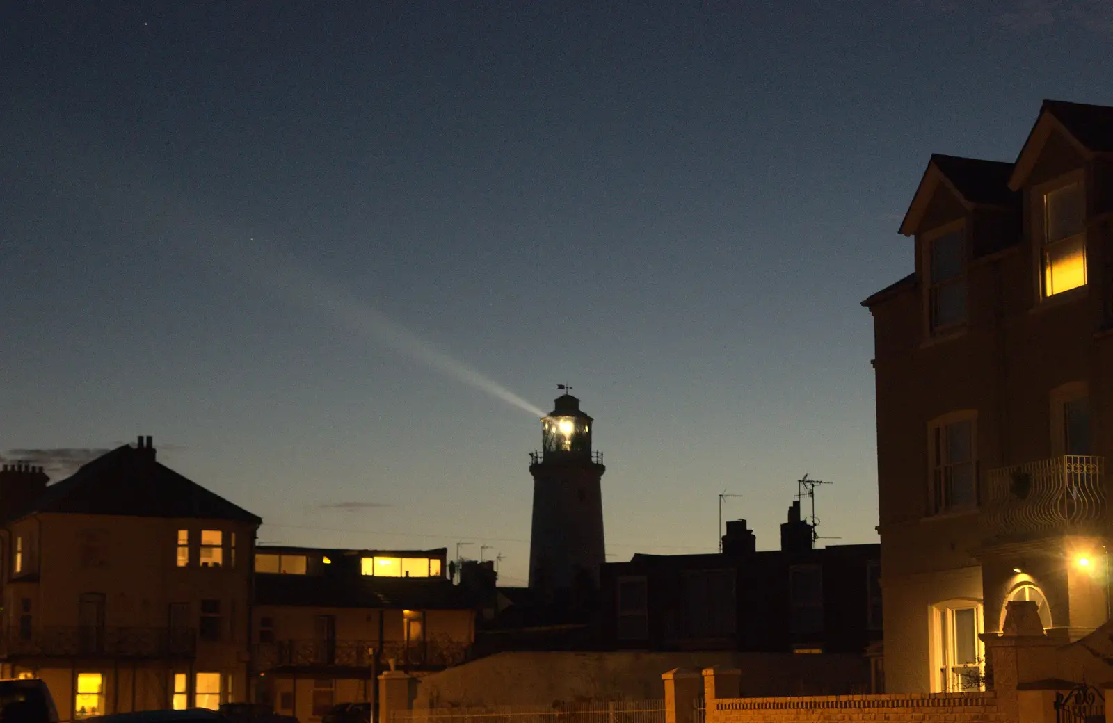 The lighthouse beams out to sea, from Sunset on the Beach, Southwold, Suffolk - 30th December 2014