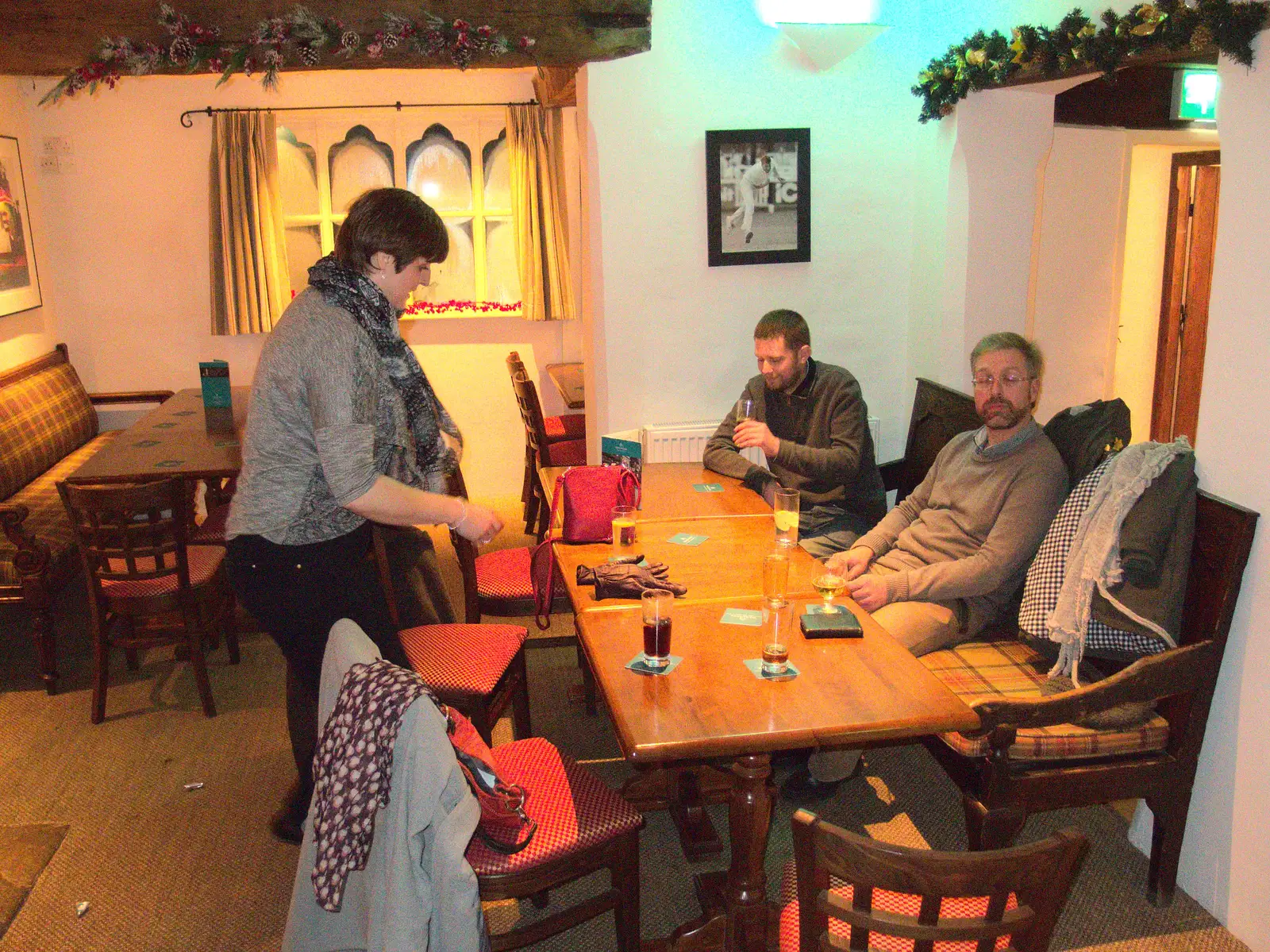 Marc looks up as Sarah sits down, from New Year's Eve at the Oaksmere, Brome, Suffolk - 31st December 2014