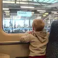 Harry peers out of the window at Ipswich, The Mobile Train Office, Diss to London - 5th March 2015