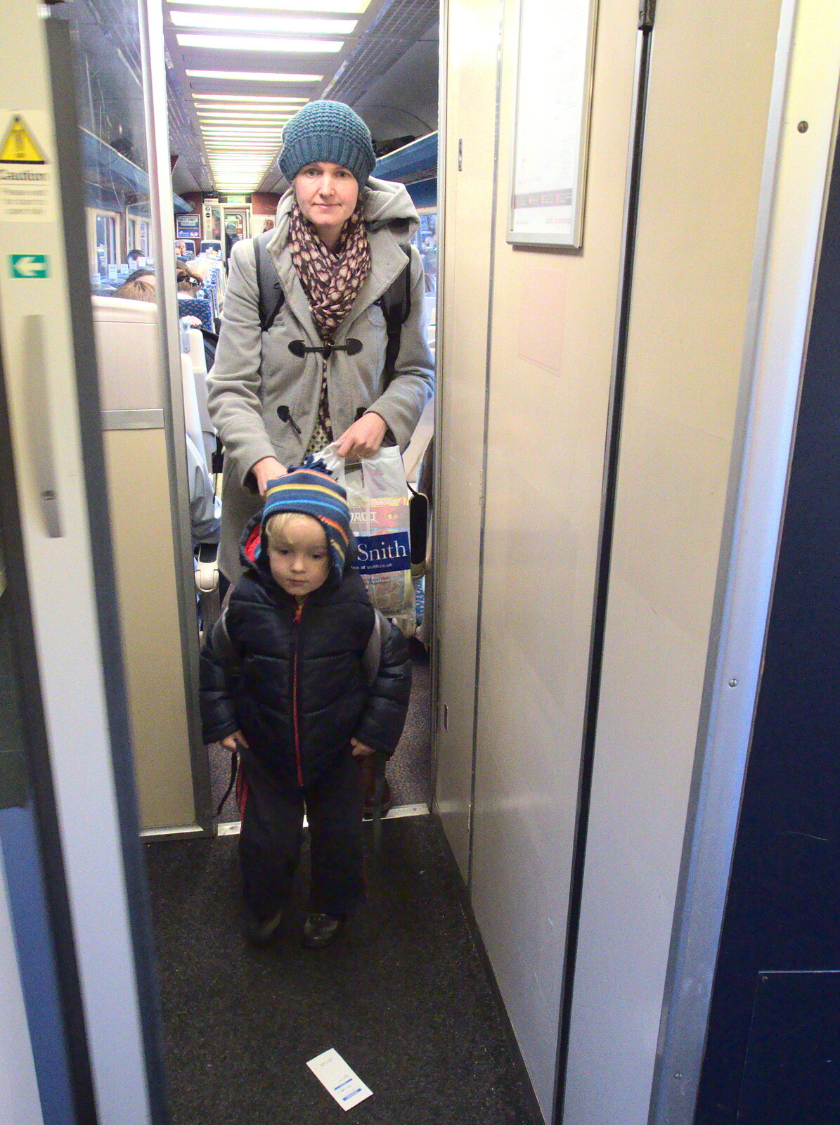Isobel and Harry exit the carriage from The Mobile Train Office, Diss to London - 5th March 2015