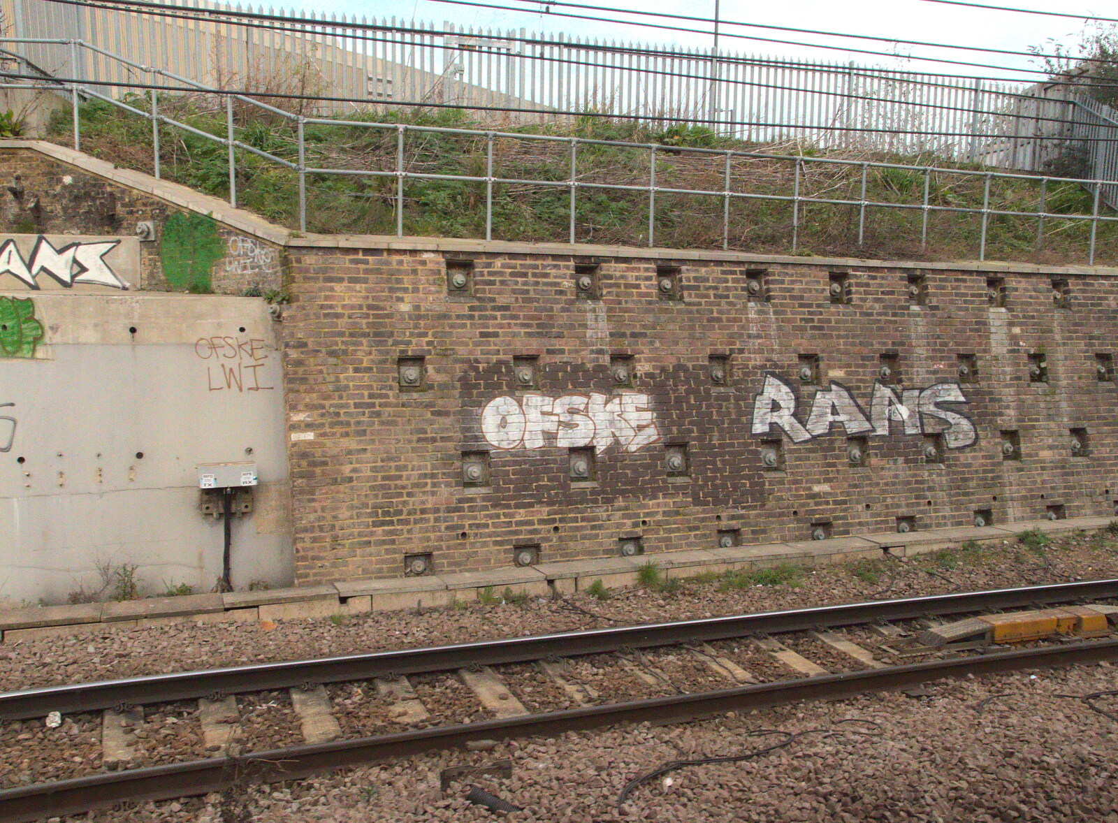 Ofske and Rans tags, on a wall like a battleship from The Mobile Train Office, Diss to London - 5th March 2015