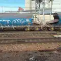 Graffiti on aggregate wagons at Stratford, The Mobile Train Office, Diss to London - 5th March 2015