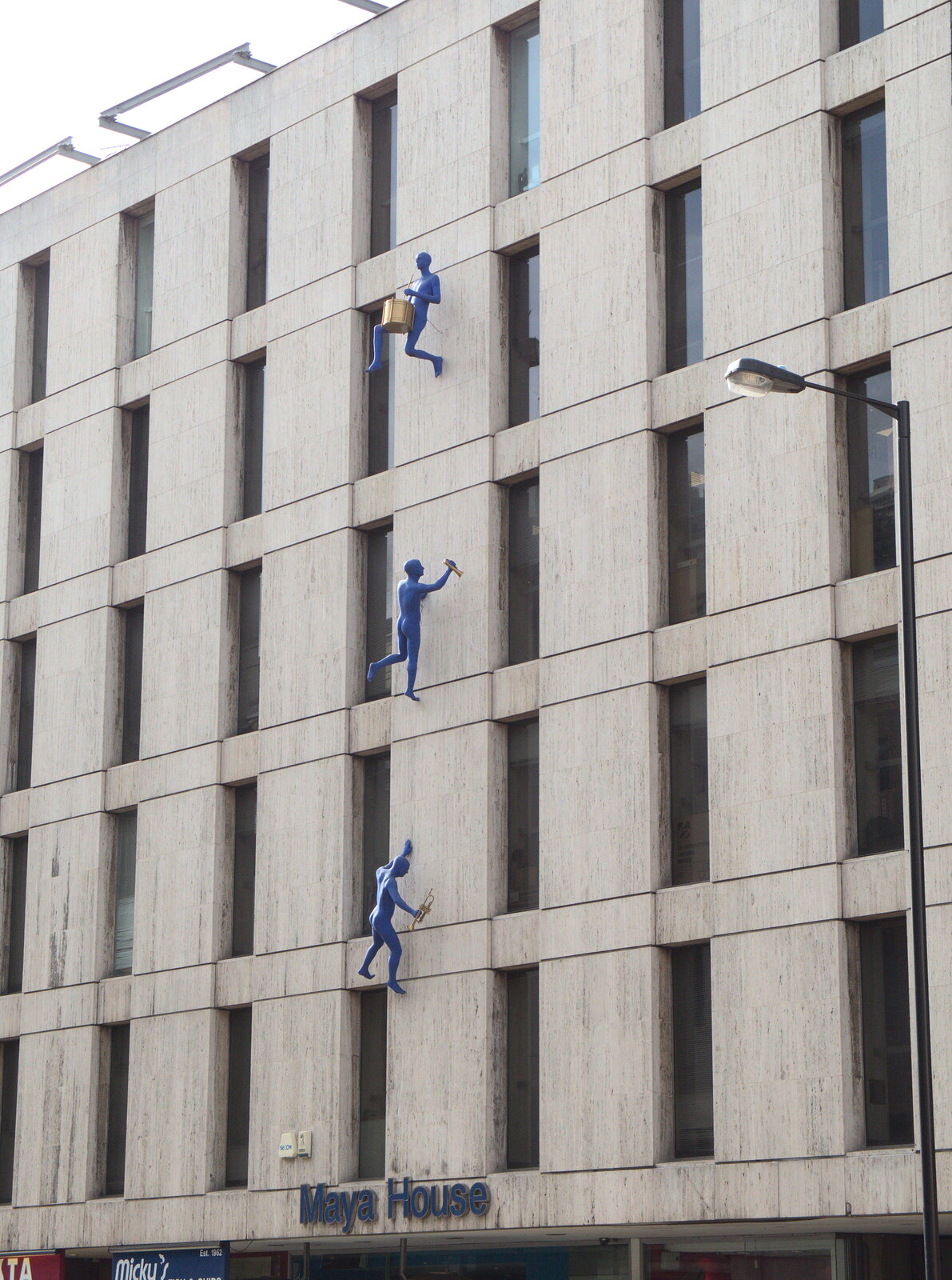 Blue men on a building on Borough High Street from The Mobile Train Office, Diss to London - 5th March 2015