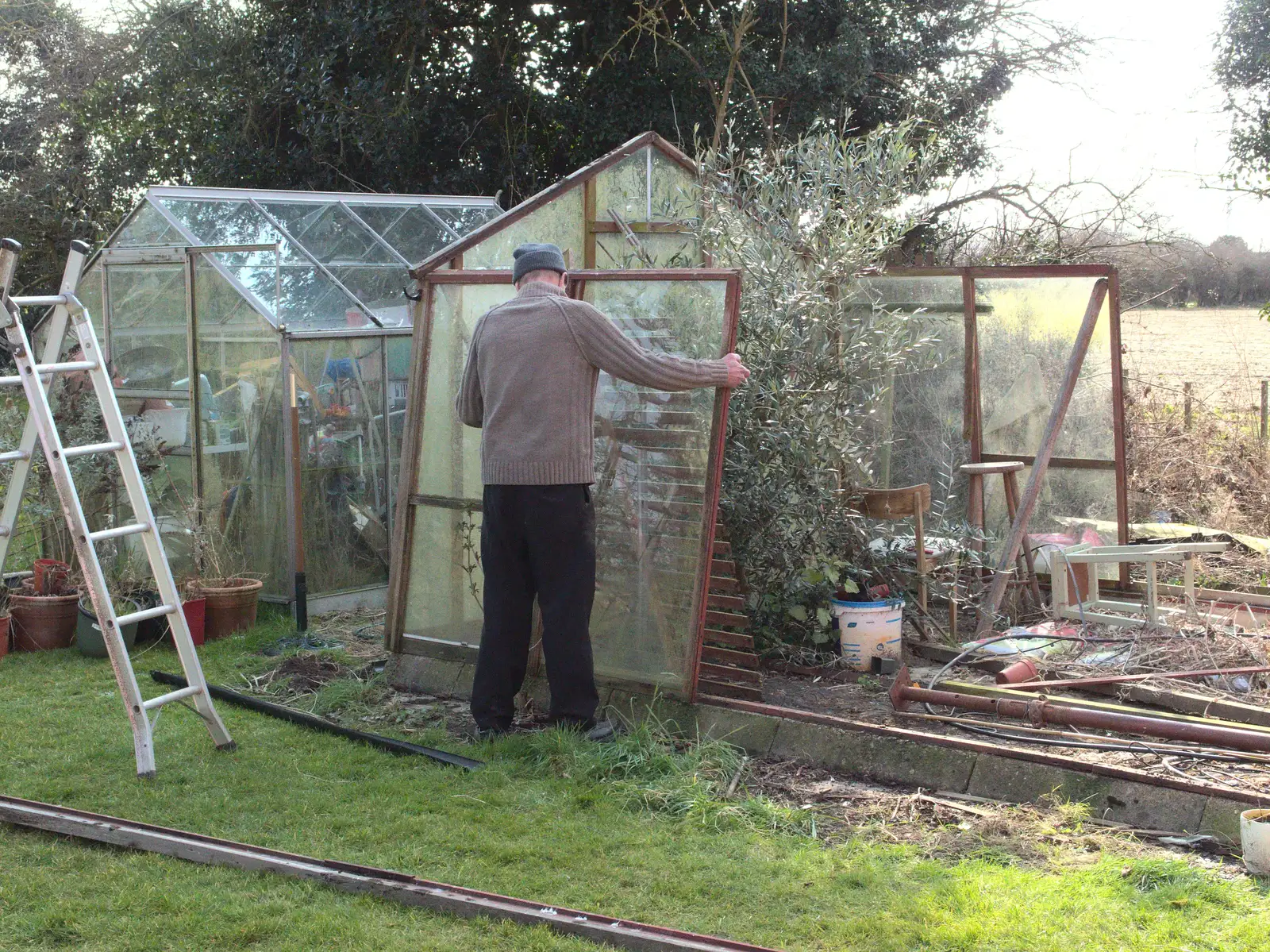 Grandad removes a panel, from A Crashed Car and Greenhouse Demolition, Brome, Suffolk - 20th March 2015