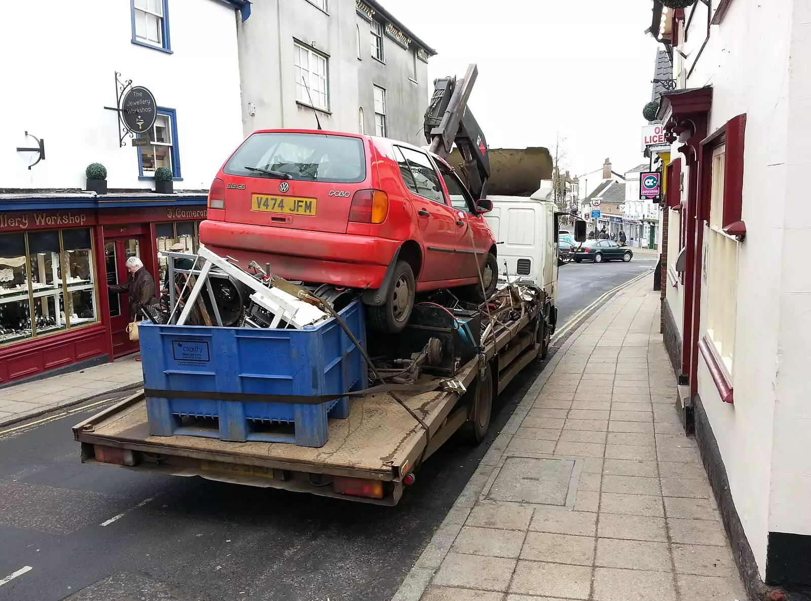 A Polo has been dropped onto a trailer as scrap, from A Crashed Car and Greenhouse Demolition, Brome, Suffolk - 20th March 2015