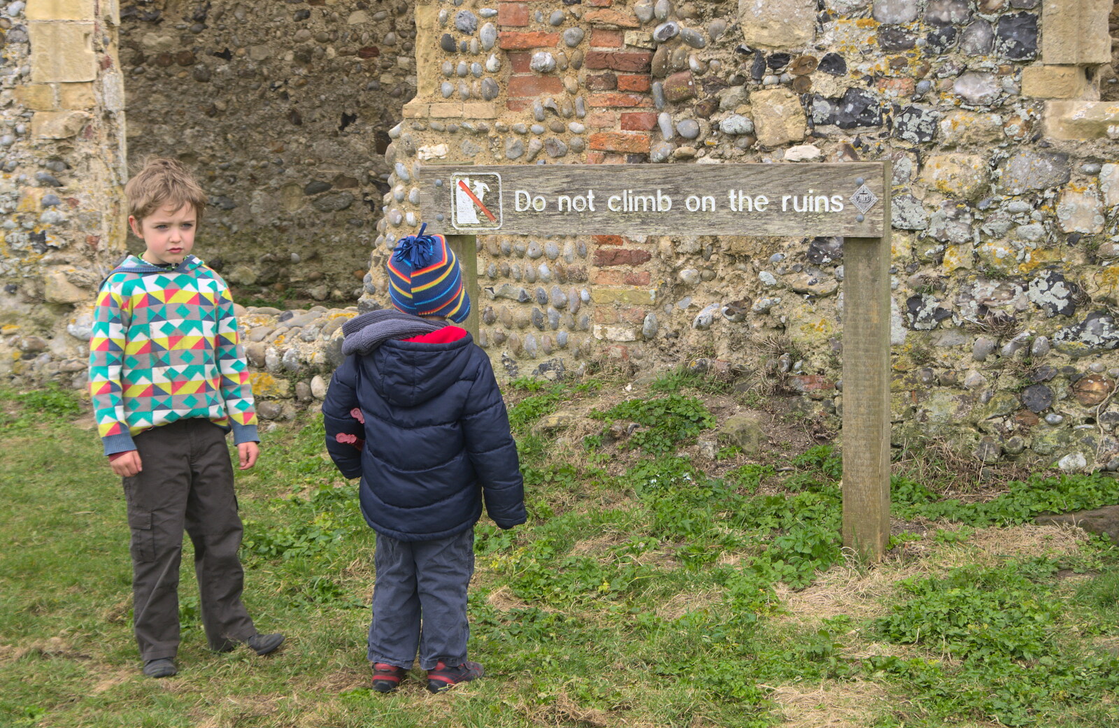 Fred looks glum as he can't climb on the ruins from A Day on the Beach, Dunwich, Suffolk - 6th April 2015