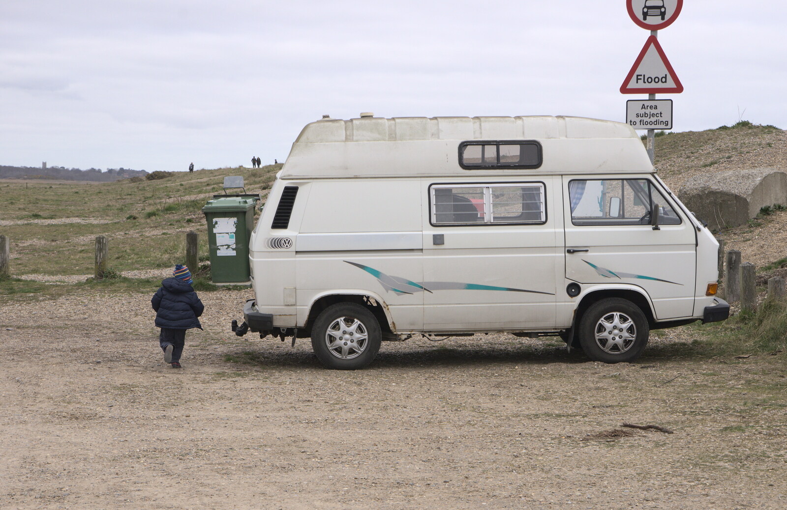 Harry legs it round the van from A Day on the Beach, Dunwich, Suffolk - 6th April 2015