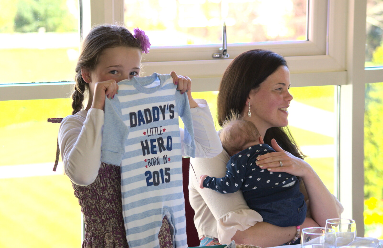 A baby gets a comedy Baby-gro from James and Haryanna's Wedding, Grand Canal Dock, Dublin - 15th April 2015