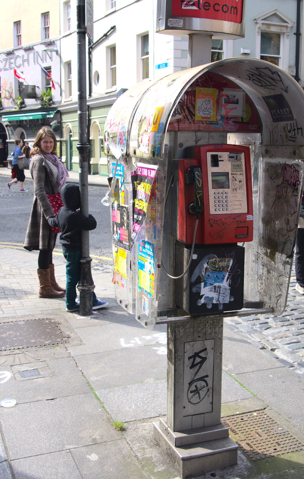 Heavily-stickered phone booth from Temple Bar and Dun Laoghaire, Dublin, Ireland - 16th April 2015