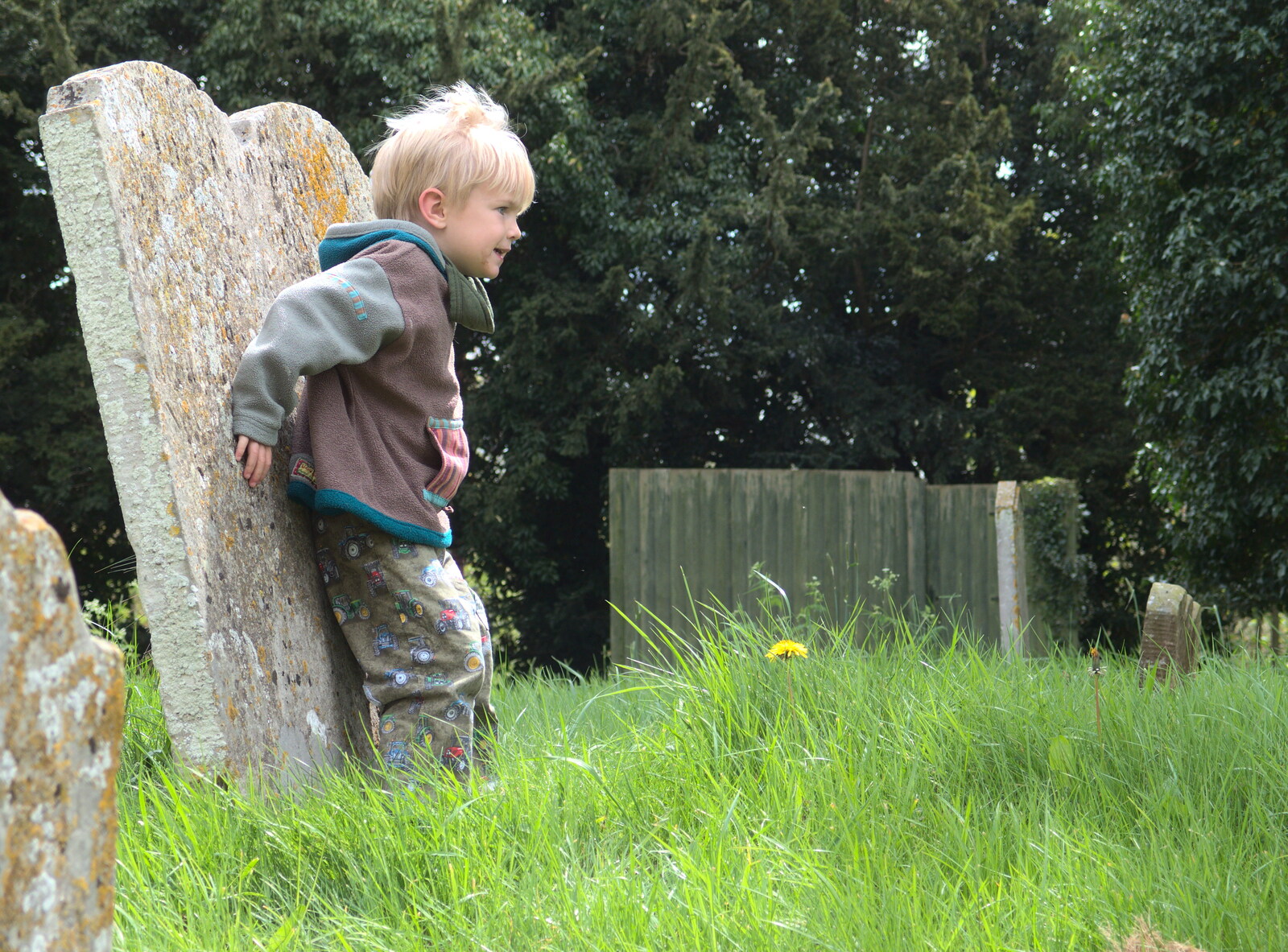 Harry leans on a gravestone from The Oaksmere's First Year Anniversary, Brome, Suffolk - 23rd April 2015