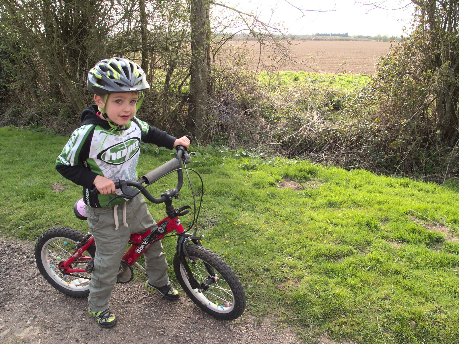 Fred on his bike from Making Dens: Rosie's Birthday, Thornham, Suffolk - 25th April 2015