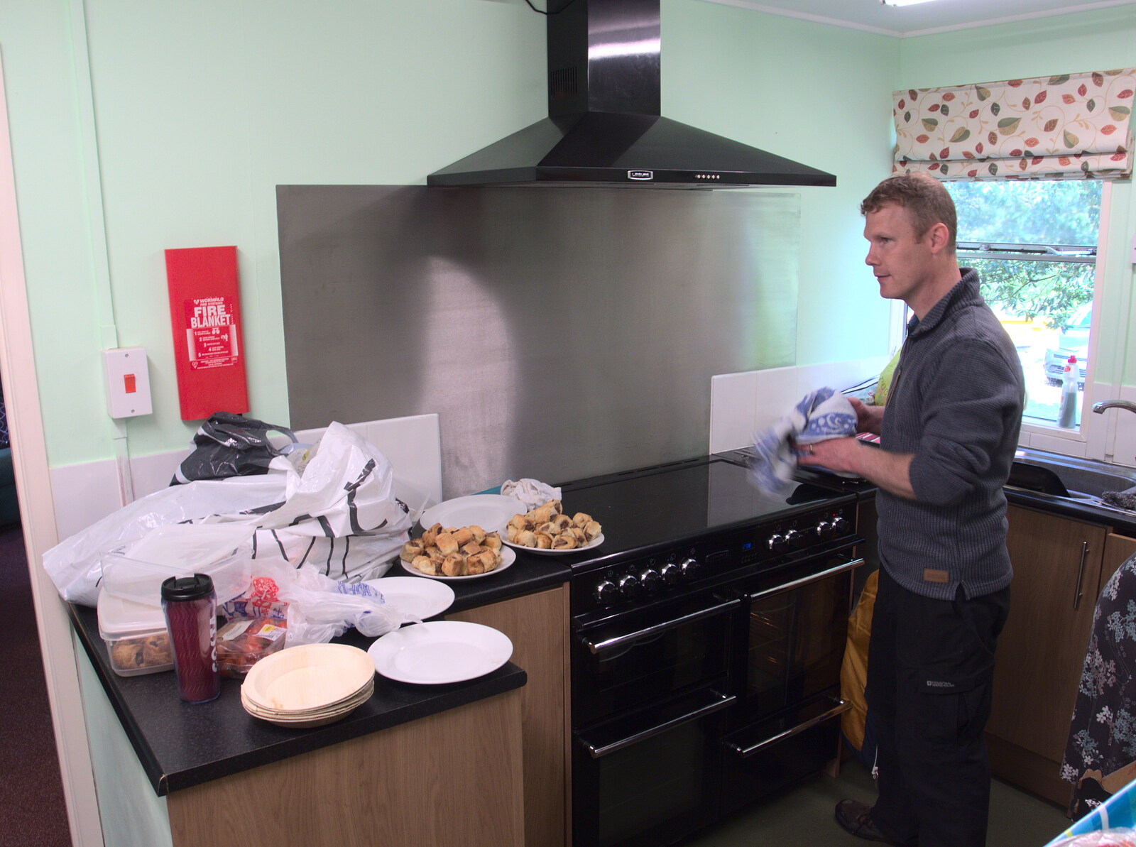 Mikey P sorts out sausage rolls in the kitchen from Making Dens: Rosie's Birthday, Thornham, Suffolk - 25th April 2015