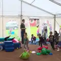 The sprogs swarm into the marquee, Making Dens: Rosie's Birthday, Thornham, Suffolk - 25th April 2015