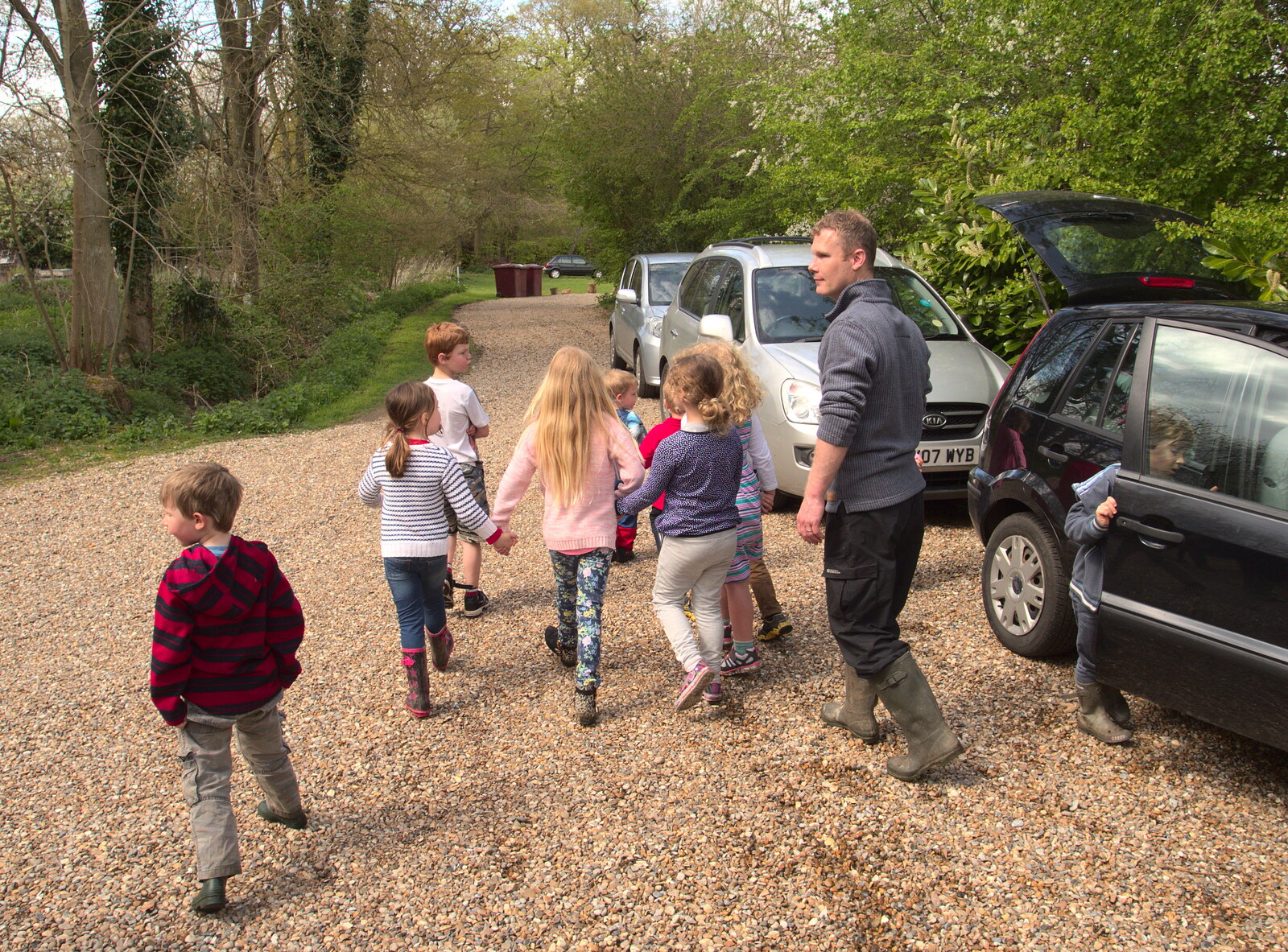 Herding the children down to the woods from Making Dens: Rosie's Birthday, Thornham, Suffolk - 25th April 2015