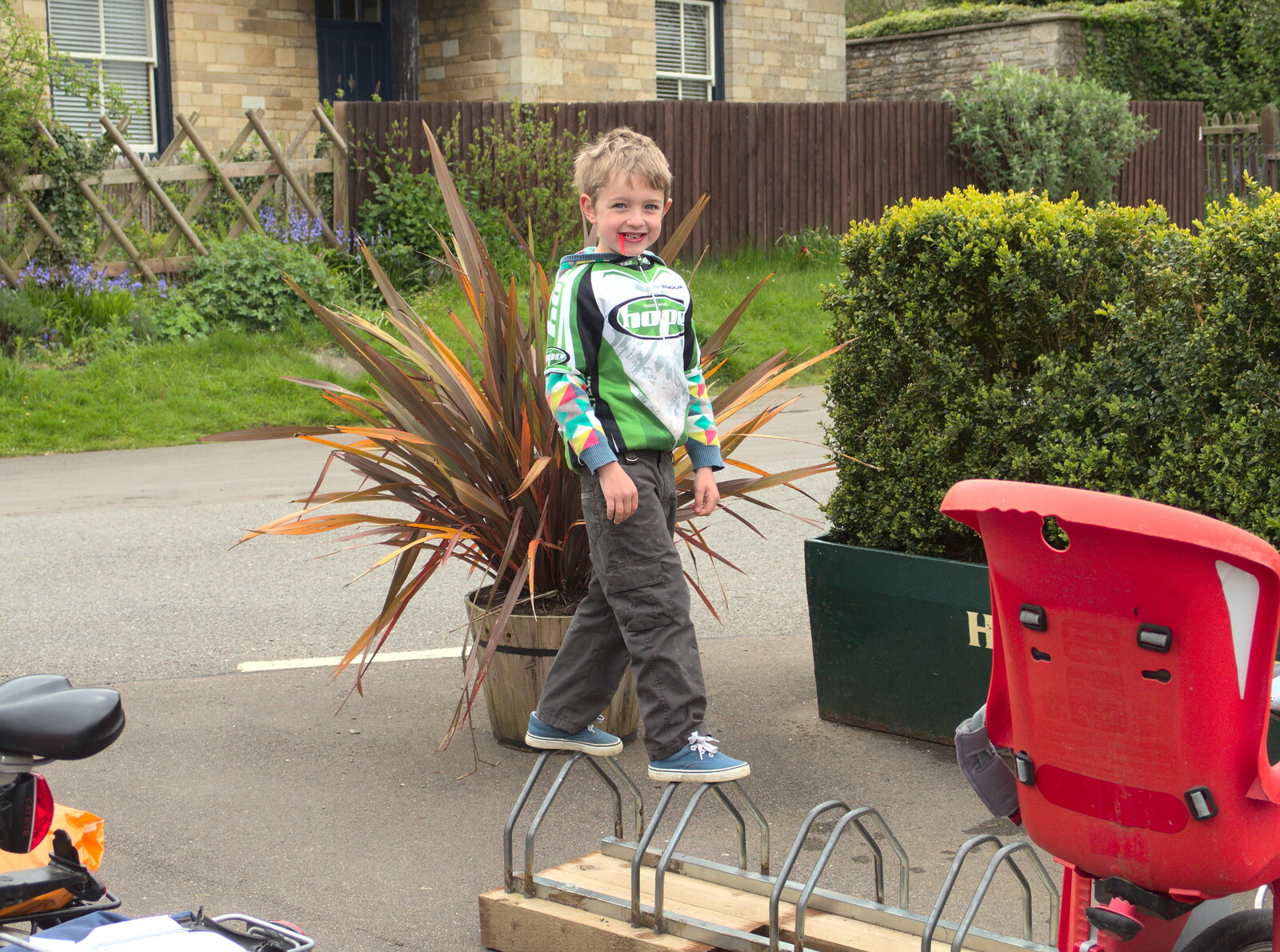 Fred does some balancing on a bike rack from The BSCC Weekend Away, Lyddington, Rutland - 9th May 2015