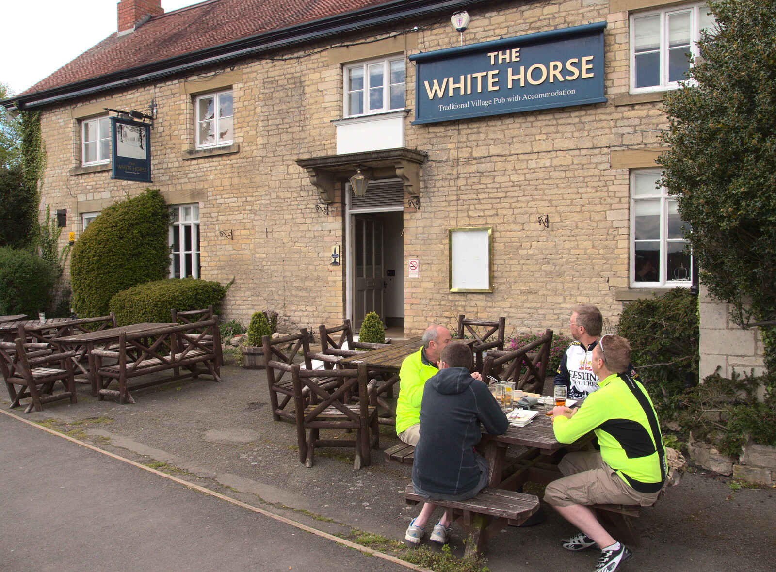 DH, Phil, Marc and Gaz sit outside in the cold from The BSCC Weekend Away, Lyddington, Rutland - 9th May 2015
