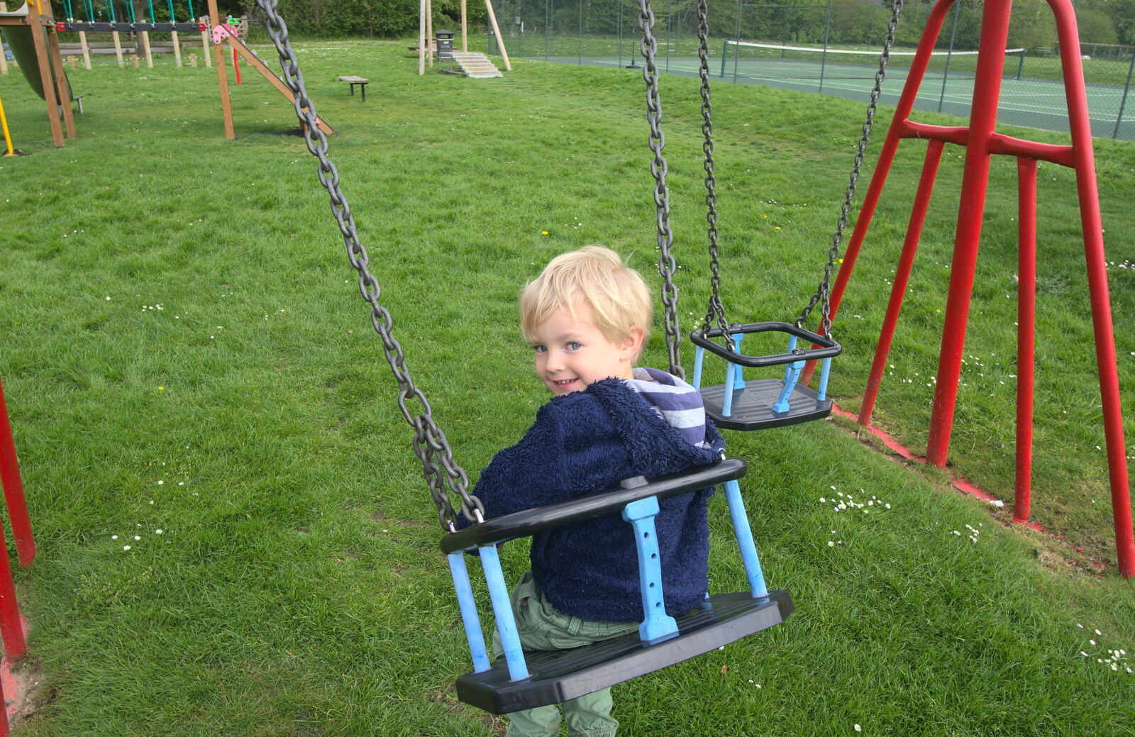 Harry on the swings from The BSCC Weekend Away, Lyddington, Rutland - 9th May 2015