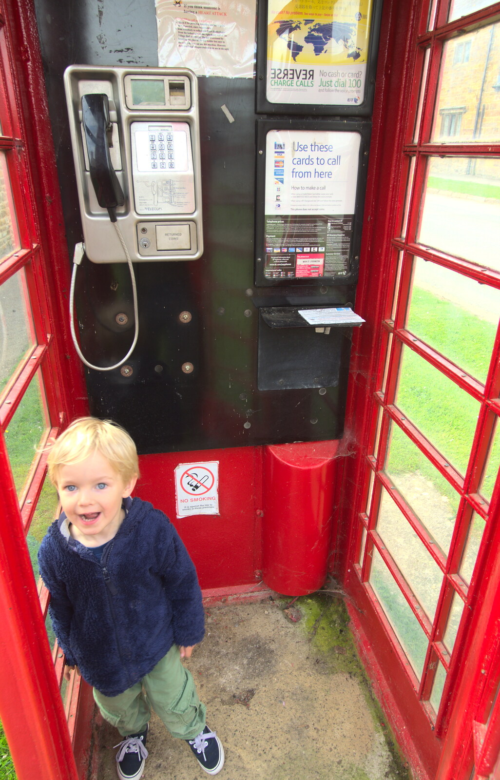 Harry tries out a phone box for the first time from The BSCC Weekend Away, Lyddington, Rutland - 9th May 2015