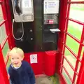 Harry tries out a phone box for the first time, The BSCC Weekend Away, Lyddington, Rutland - 9th May 2015