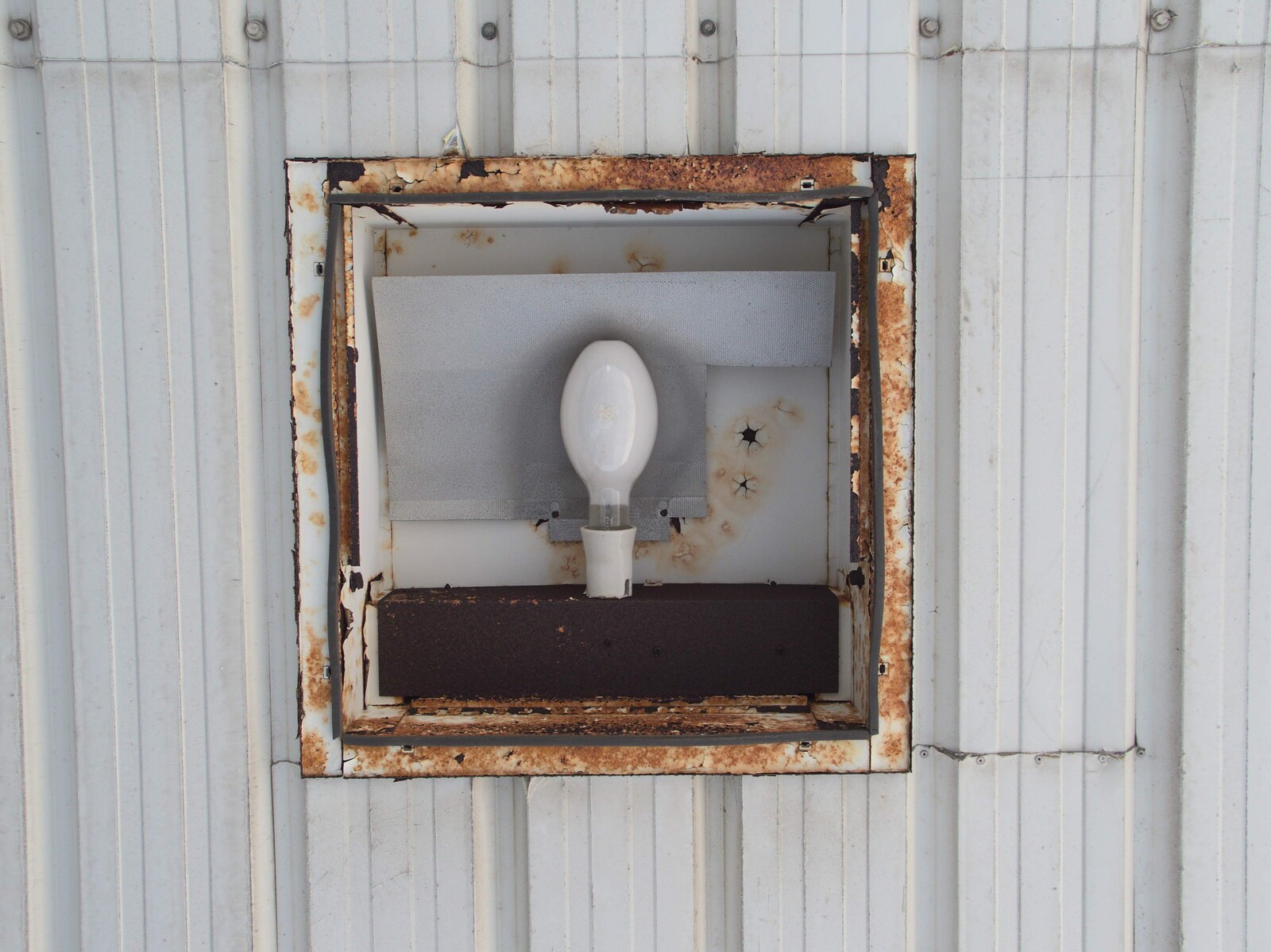 A rusted-out light fitting in the roof from A Derelict Petrol Station, Palgrave, Suffolk - 16th May 2015