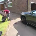 The Boy Phil is sorting out a flat tyre, A Derelict Petrol Station, Palgrave, Suffolk - 16th May 2015