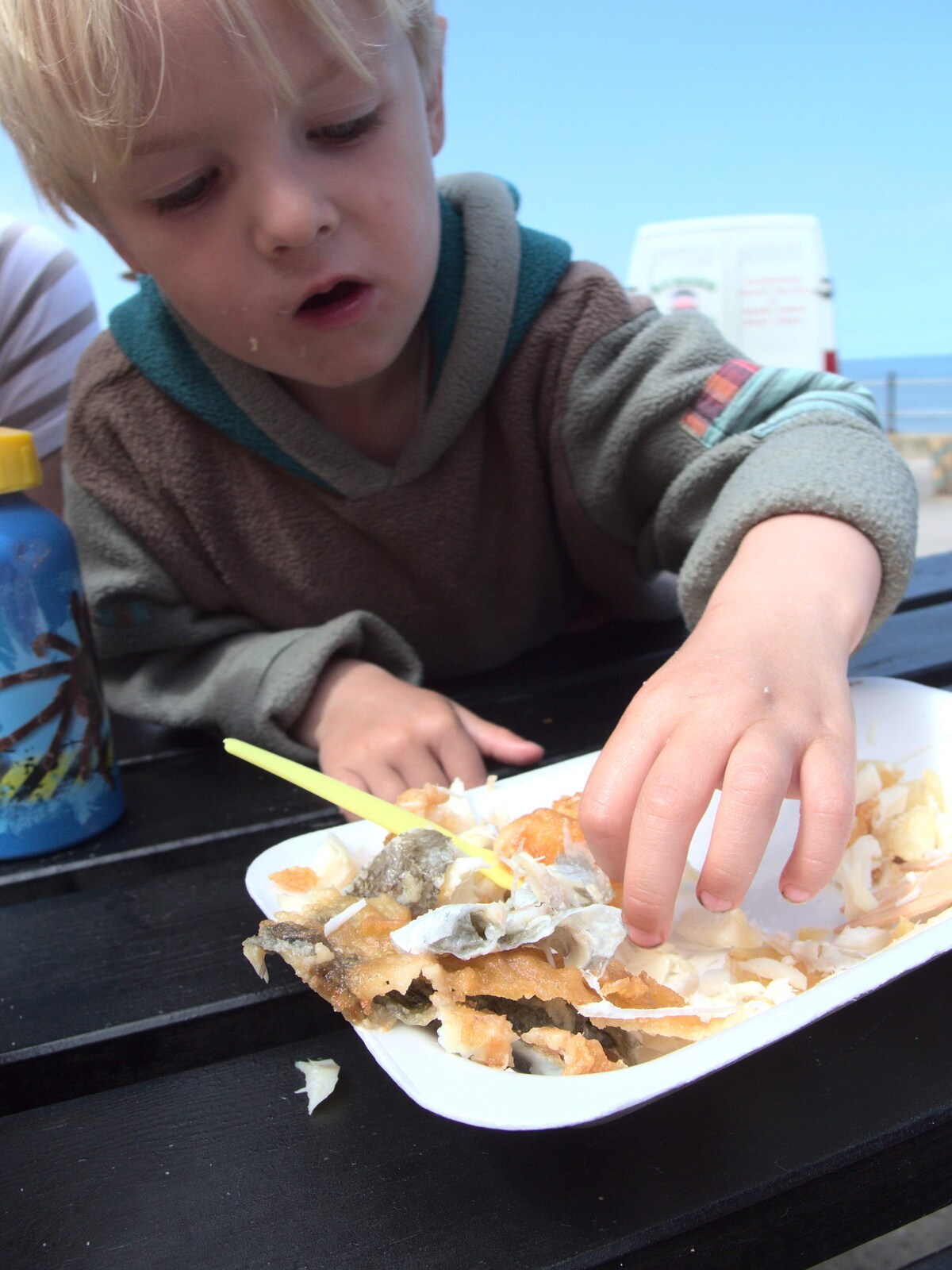 Harry eats some fish from A Birthday Camping Trip, East Runton, North Norfolk - 26th May 2015