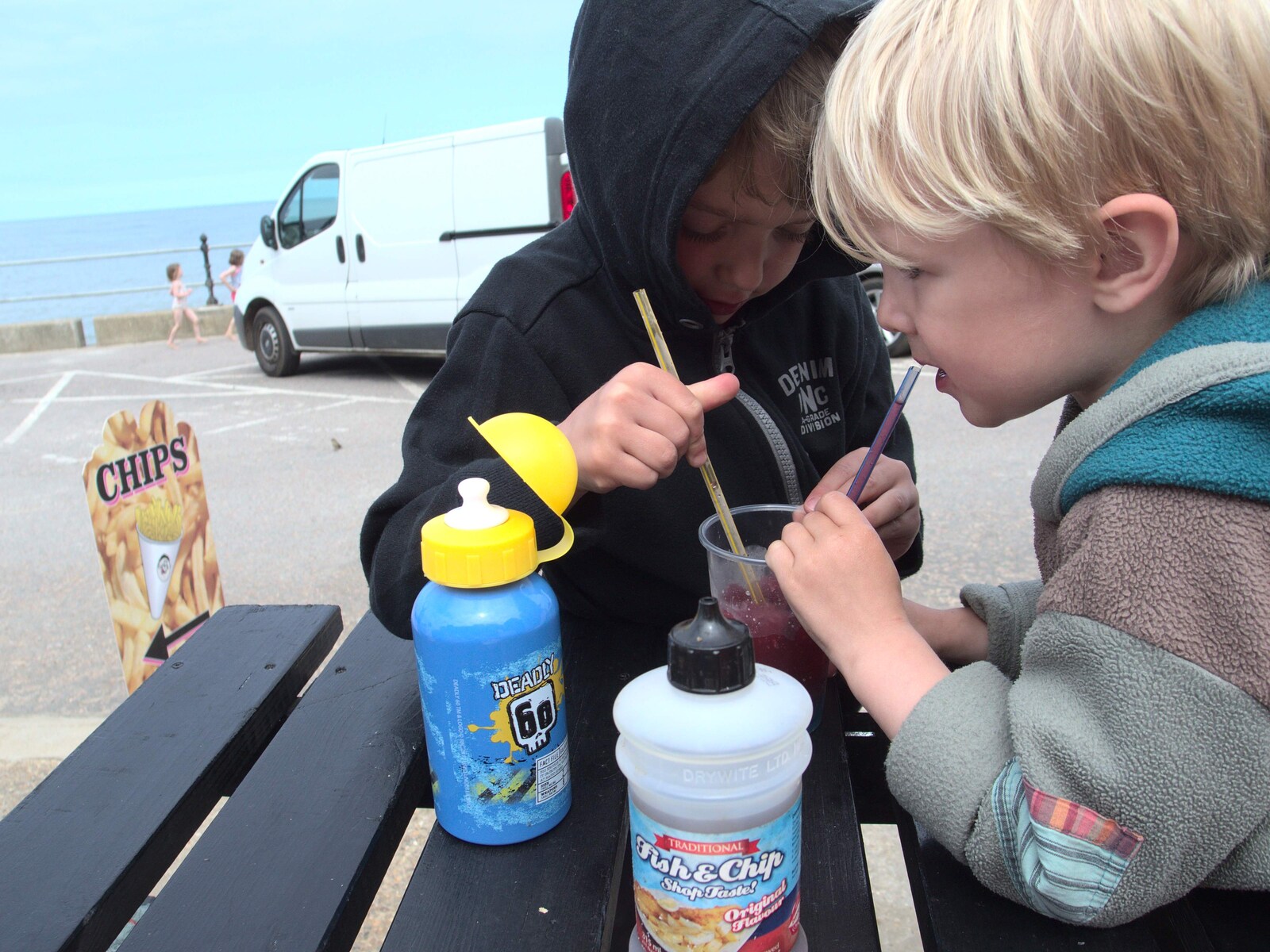 Fred and Harry slurp their new favourite slushies from A Birthday Camping Trip, East Runton, North Norfolk - 26th May 2015
