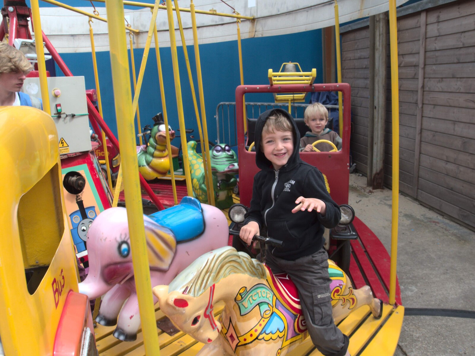 Fred on a carousel from A Birthday Camping Trip, East Runton, North Norfolk - 26th May 2015