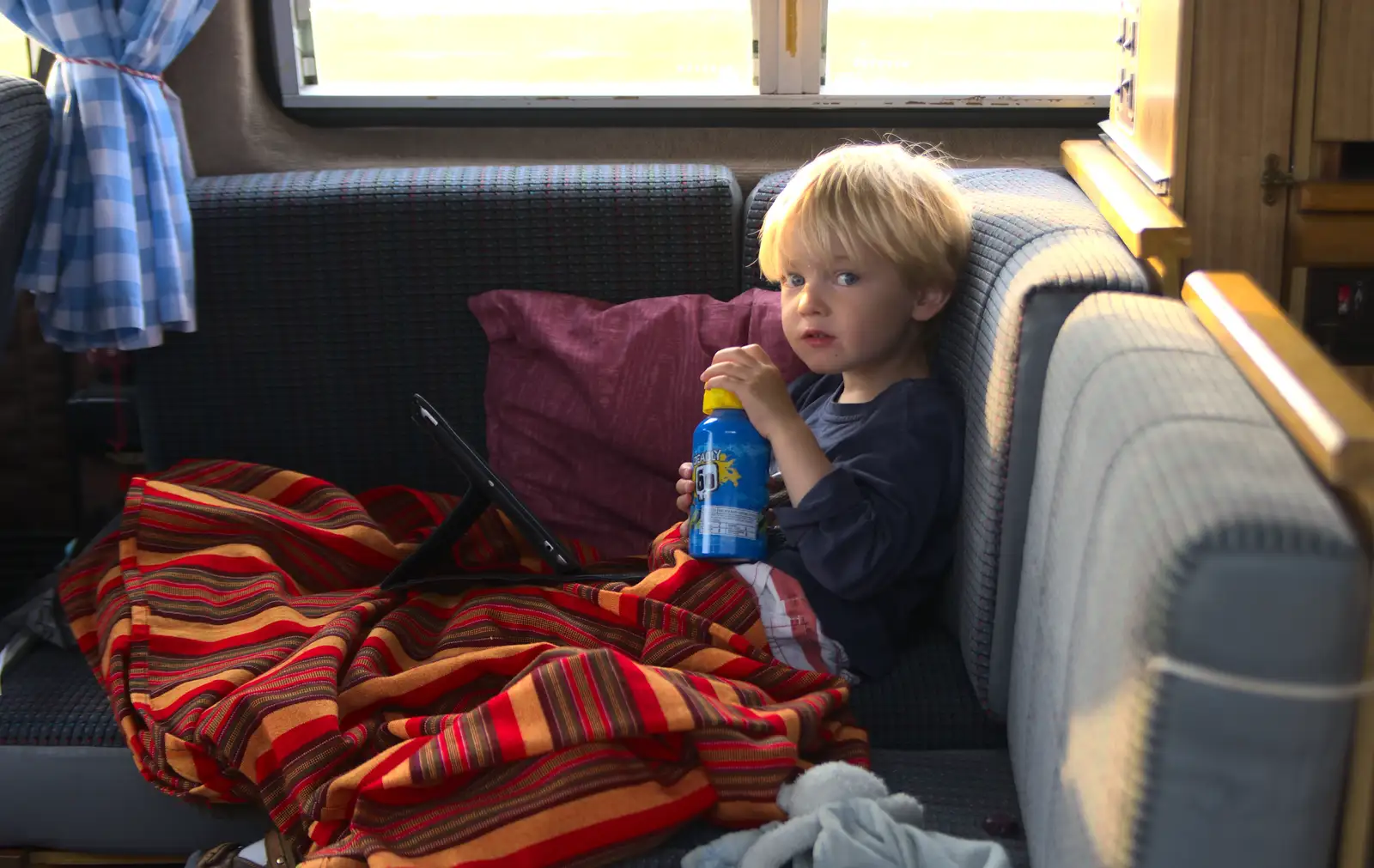 Harry watches the poo-pad in the van, from A Wet Weekend of Camping, Waxham Sands, Norfolk - 13th June 2015