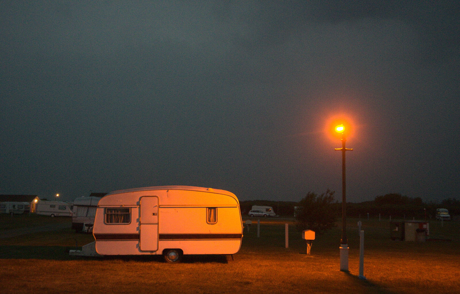 A sodium-lit caravan from A Wet Weekend of Camping, Waxham Sands, Norfolk - 13th June 2015
