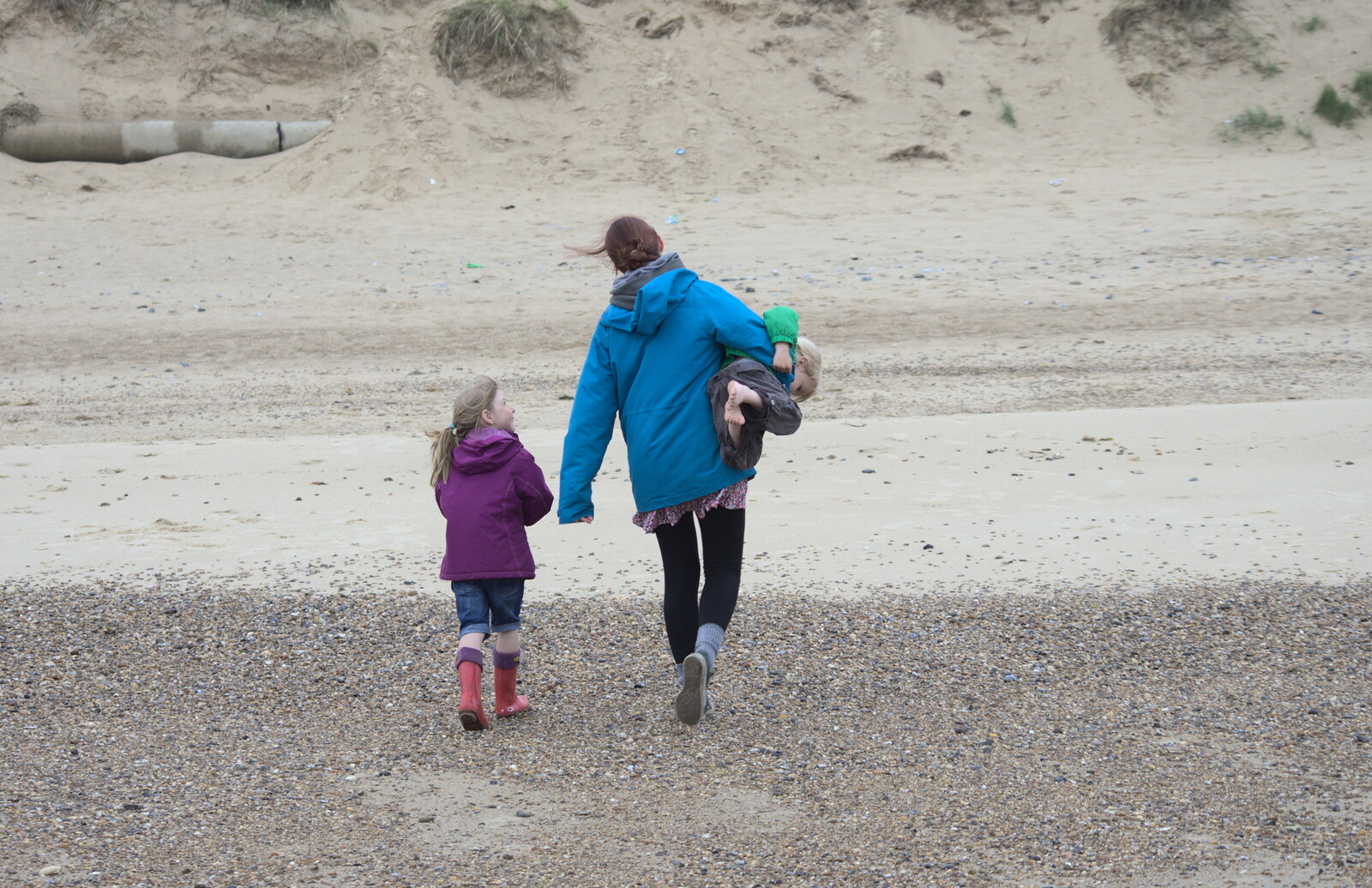 Isobel hauls Harry up the beach from A Wet Weekend of Camping, Waxham Sands, Norfolk - 13th June 2015