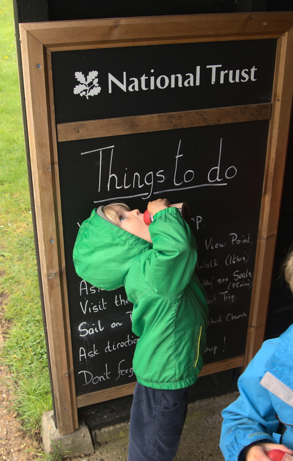 Harry by the 'Things to do' board from A Wet Weekend of Camping, Waxham Sands, Norfolk - 13th June 2015