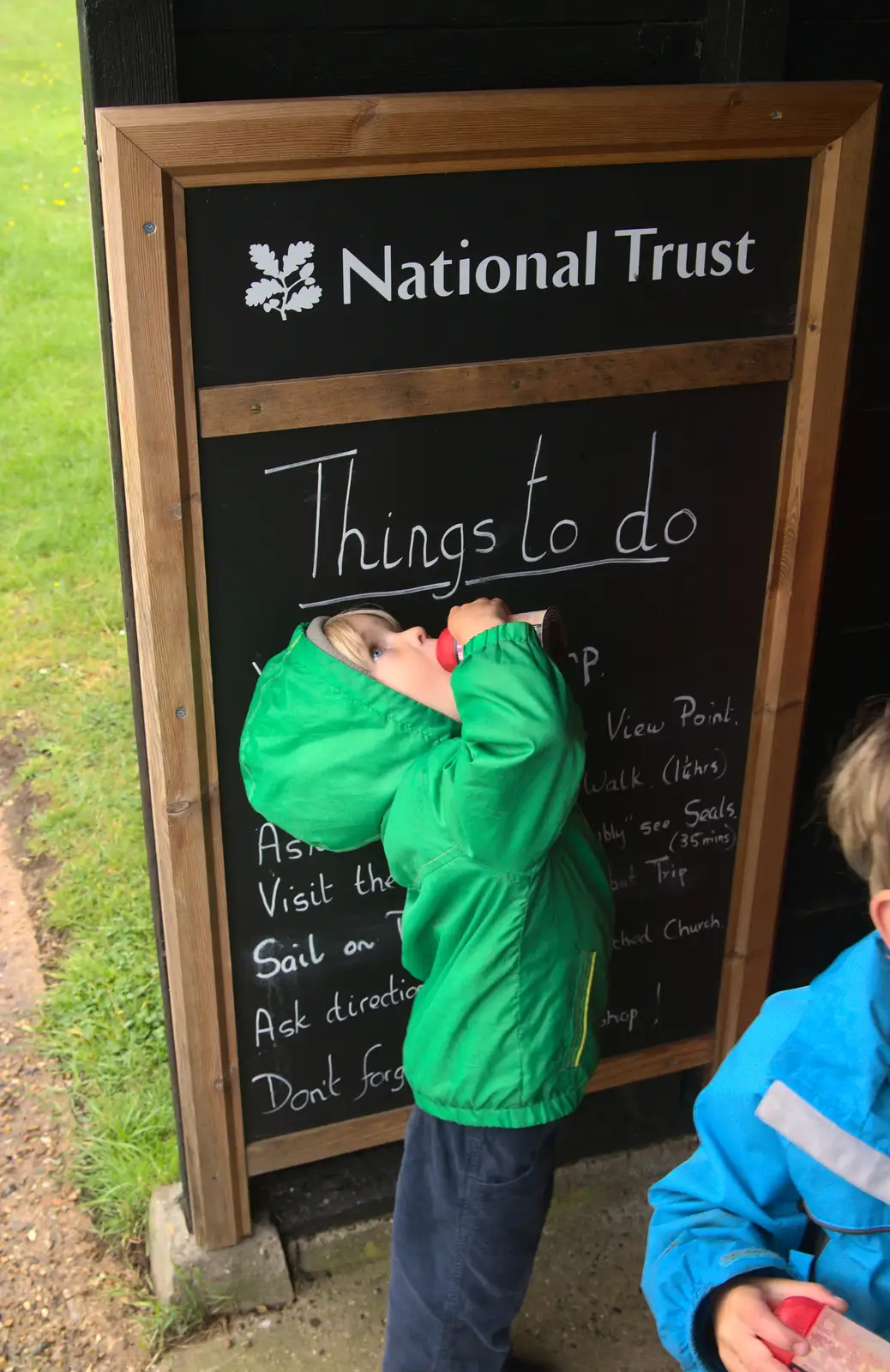 Harry by the 'Things to do' board, from A Wet Weekend of Camping, Waxham Sands, Norfolk - 13th June 2015