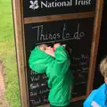 Harry by the 'Things to do' board, A Wet Weekend of Camping, Waxham Sands, Norfolk - 13th June 2015