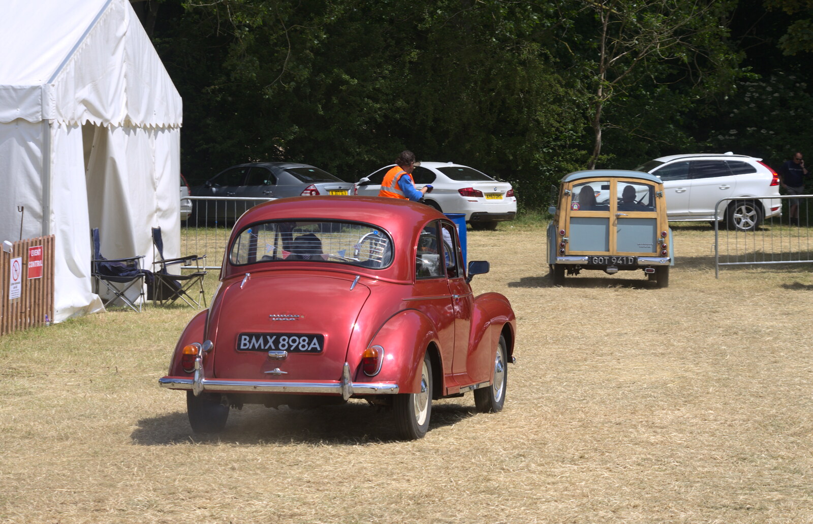 A shiny pink/red Morris Minor drives away from A Vintage Tractorey Sort of Day, Palgrave, Suffolk - 21st June 2015