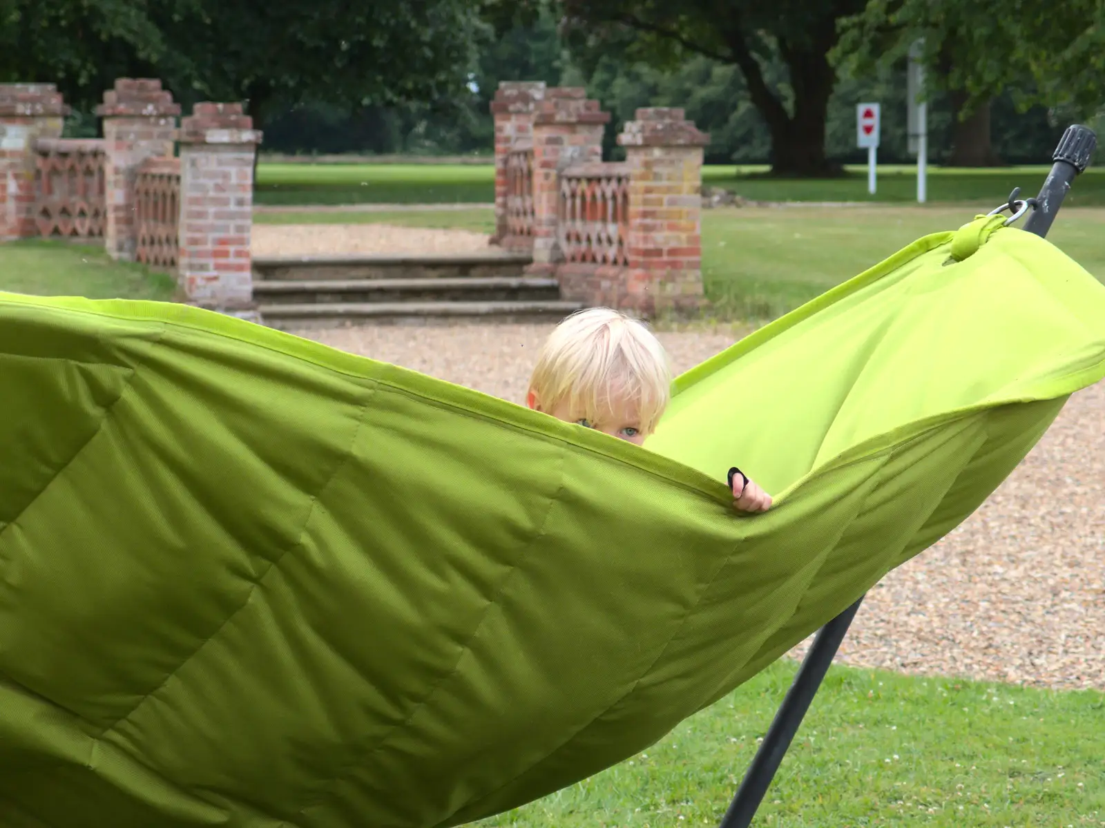 Harry peeps over the top of a hammock, from A visit from Da Gorls, Brome, Suffolk - 27th June 2015