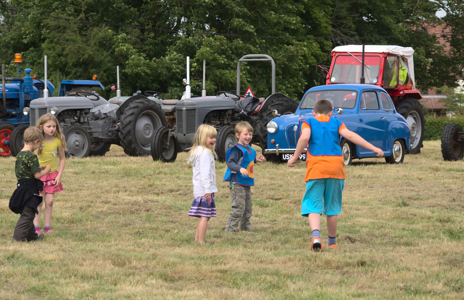 The children mess around out on the green from Thrandeston Pig Roast, Thrandeston Little Green, Suffolk - 28th June 2015