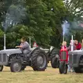 The tractors fire up again, Thrandeston Pig Roast, Thrandeston Little Green, Suffolk - 28th June 2015